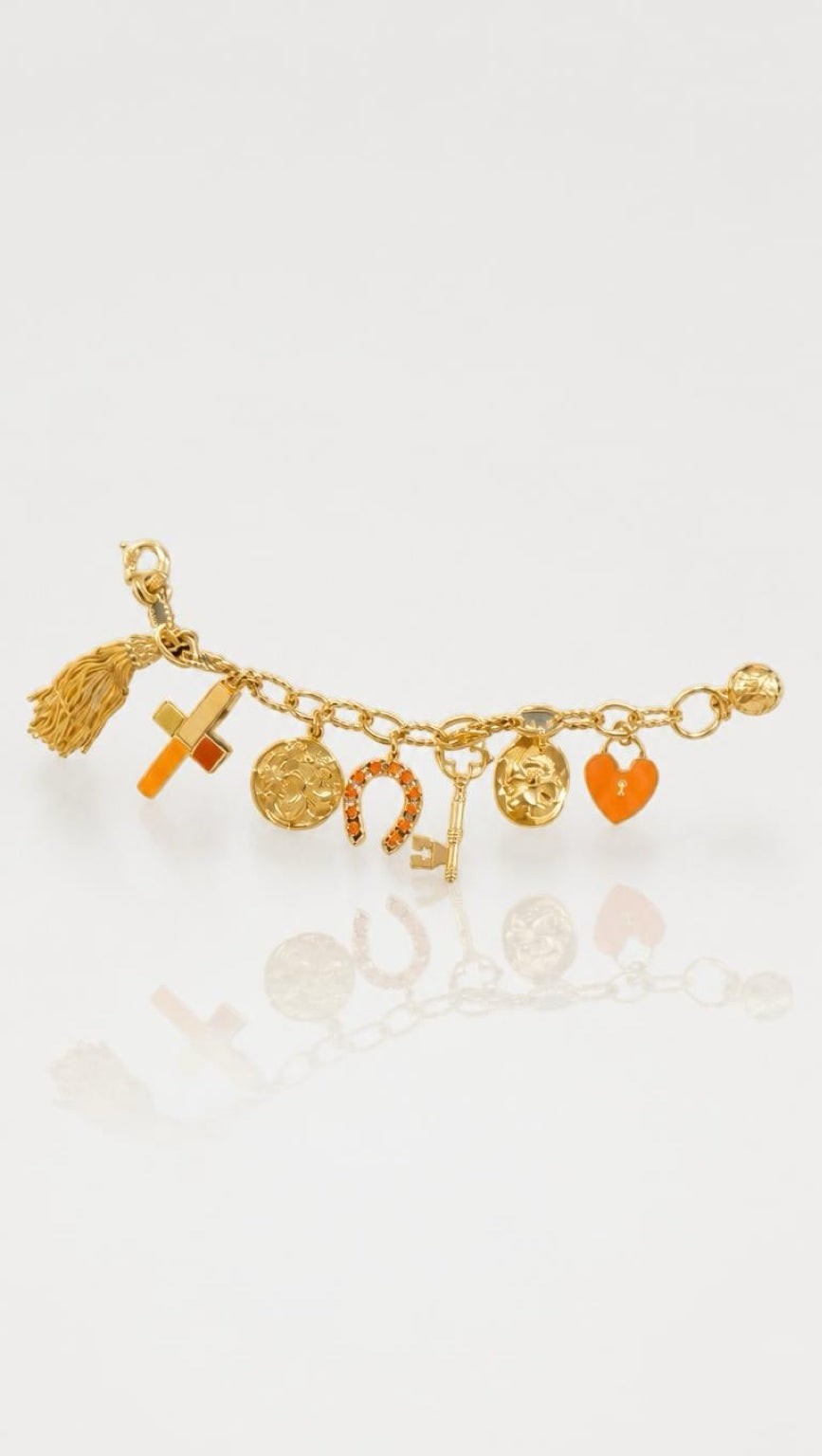 She Stories Gas Bijoux Cléa armband in goud met kleurrijke kruisbedel, munt en kwastje in bohemian stijl