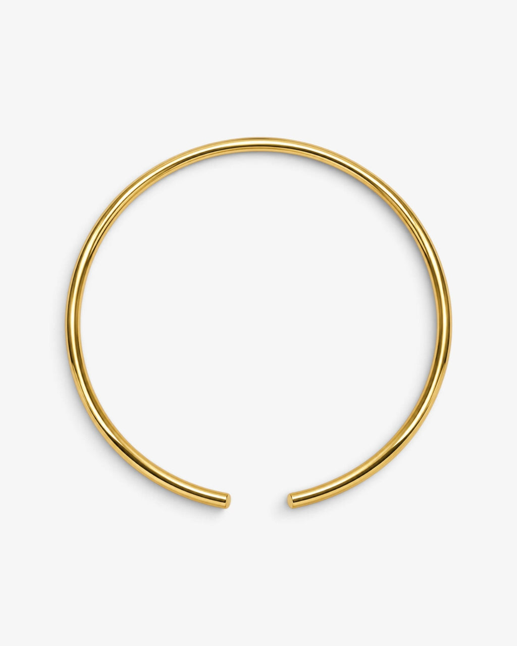 She Stories I am Jai gold plated brass bangle necklace with a minimalist open design