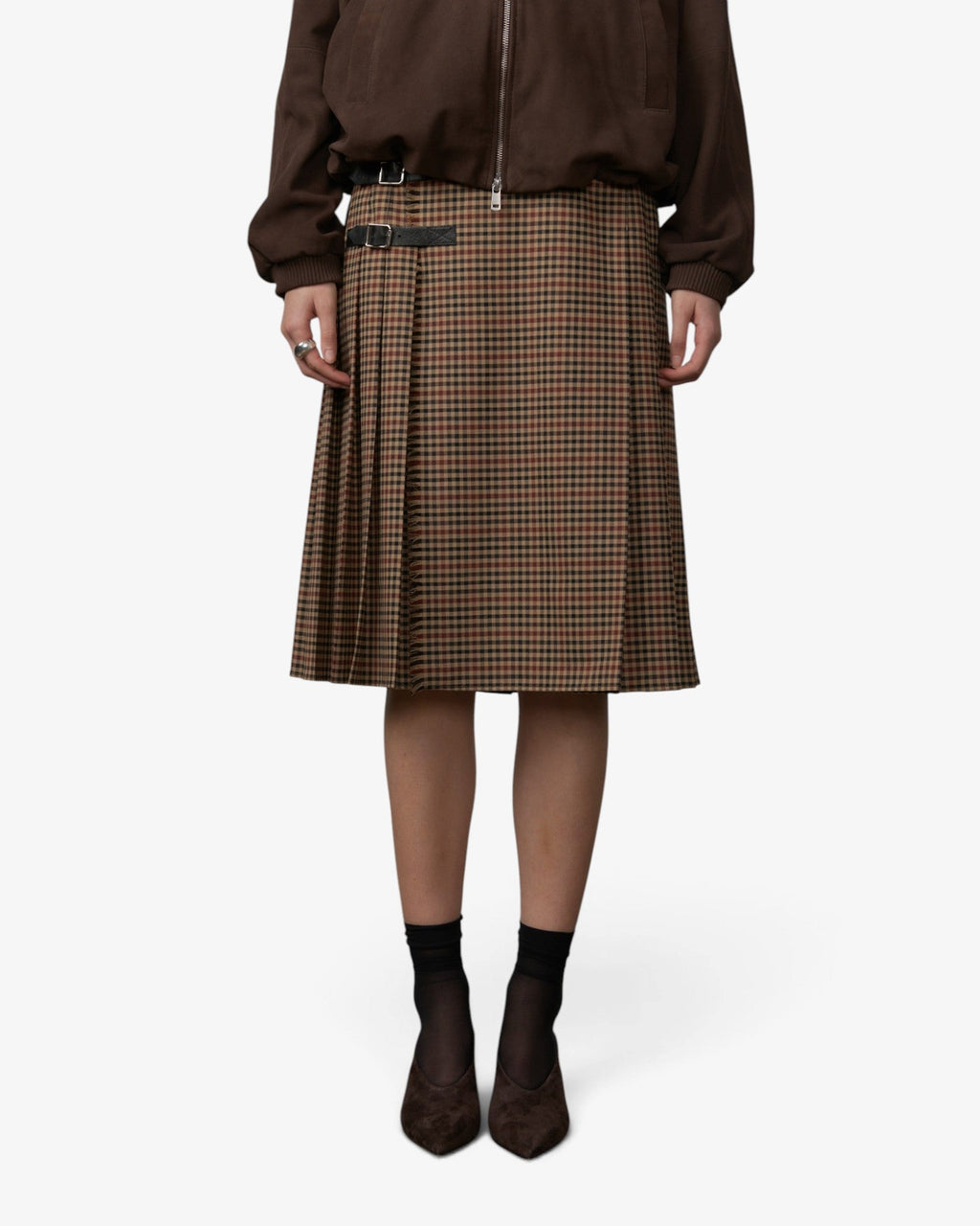 She Stories Herskind Albert skirt in brown gun check wool blend with pleated design and side buckle straps