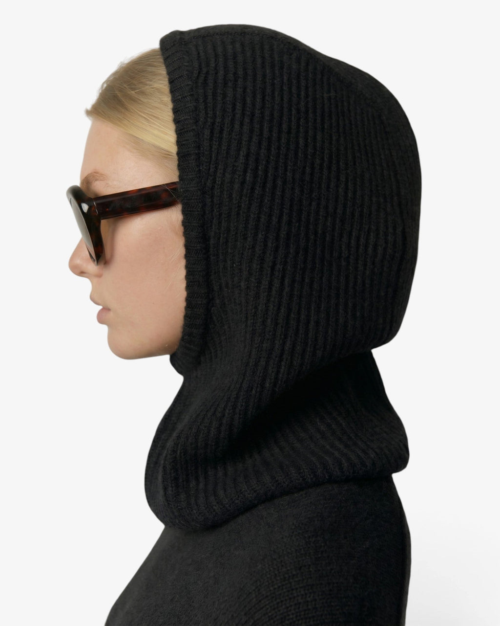 She Stories Herskind Calvin black ribbed cashmere balaclava with a minimalist design for winter warmth.