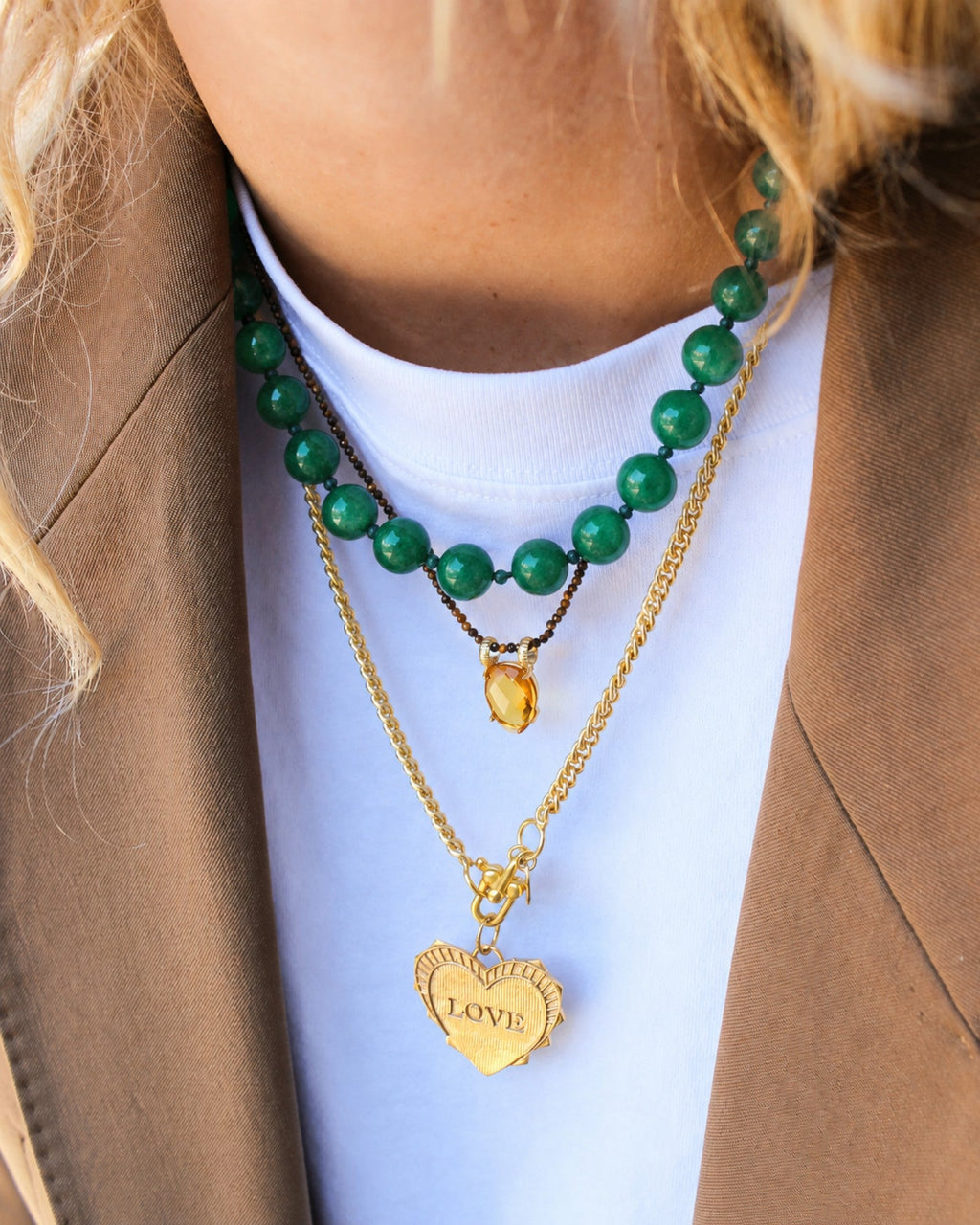 She Stories I am Jai necklace featuring round green jade beads and an 18k gold-plated brass toggle clasp.