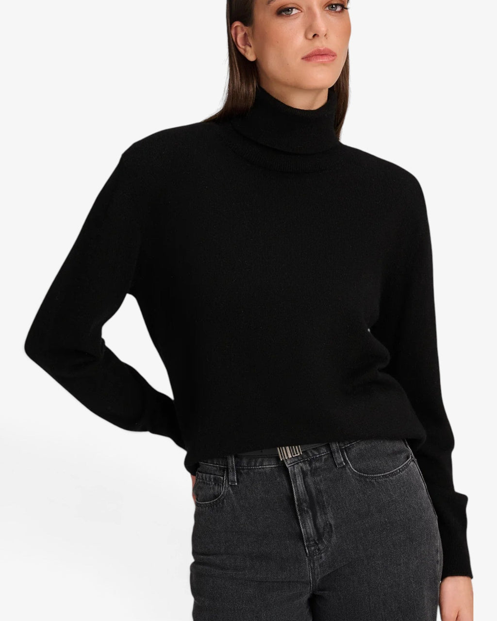 She Stories March23 black turtleneck knit sweater with long sleeves and padded shoulders in a refined silhouette.