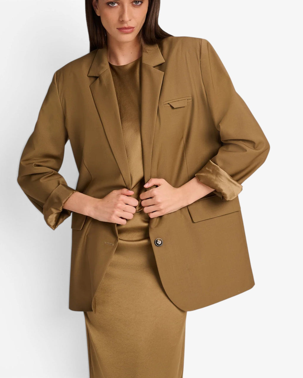 She Stories March23 Naples blazer in olive cool wool with a light oversized fit, button closure, and notched lapels.