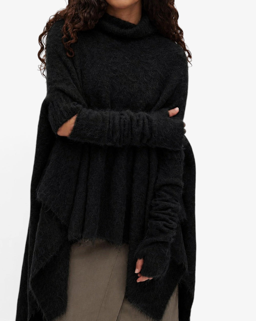 She Stories Rabens Saloner black fluffy alpaca-blend fingerless arm warmers with a soft knit texture.